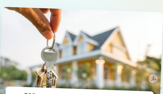 Real estate agent handing over keys to new home owner